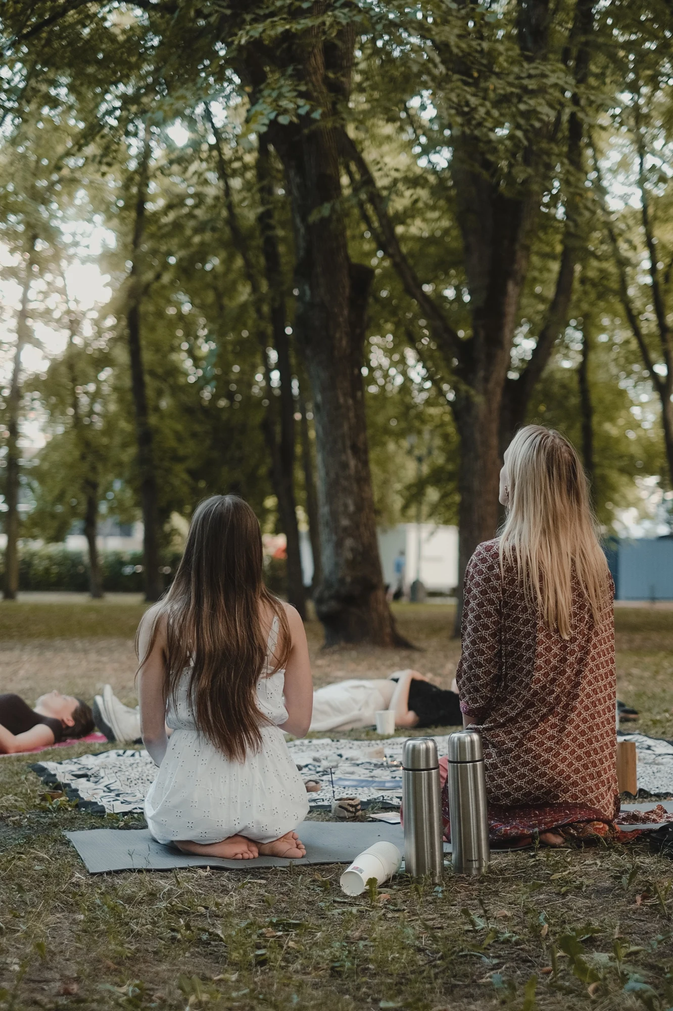 Sintija and Kristiāna guide a peaceful practice in a women’s circle.